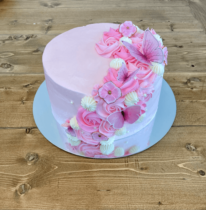Pink Sweet Cake Factory cake with floral buttercream and butterflies